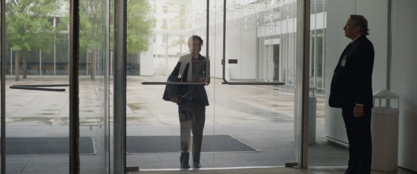 Jen Walters at the front door of Jen Walters walks across the courtyard of GLK&H.