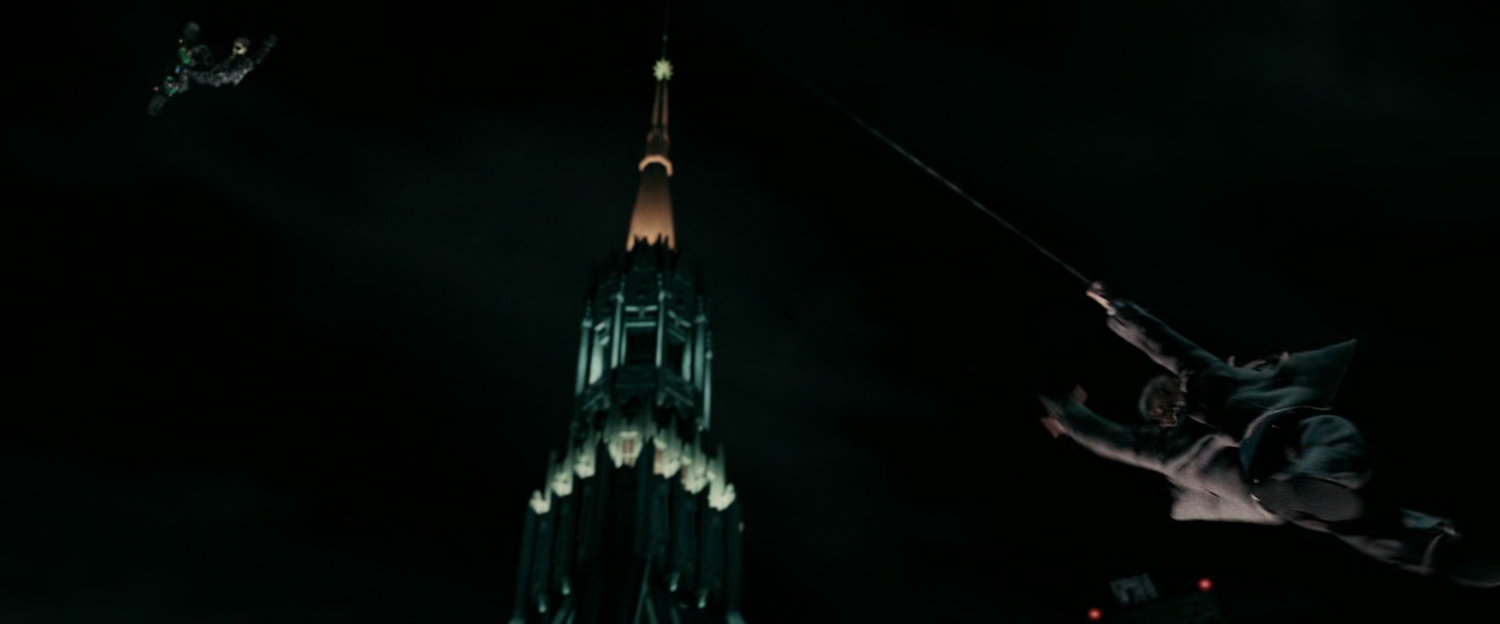 Building spire at night.