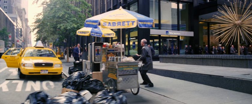 A cab pulls up in front of New York building.