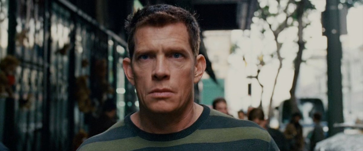 Flint Marko on sidewalk.