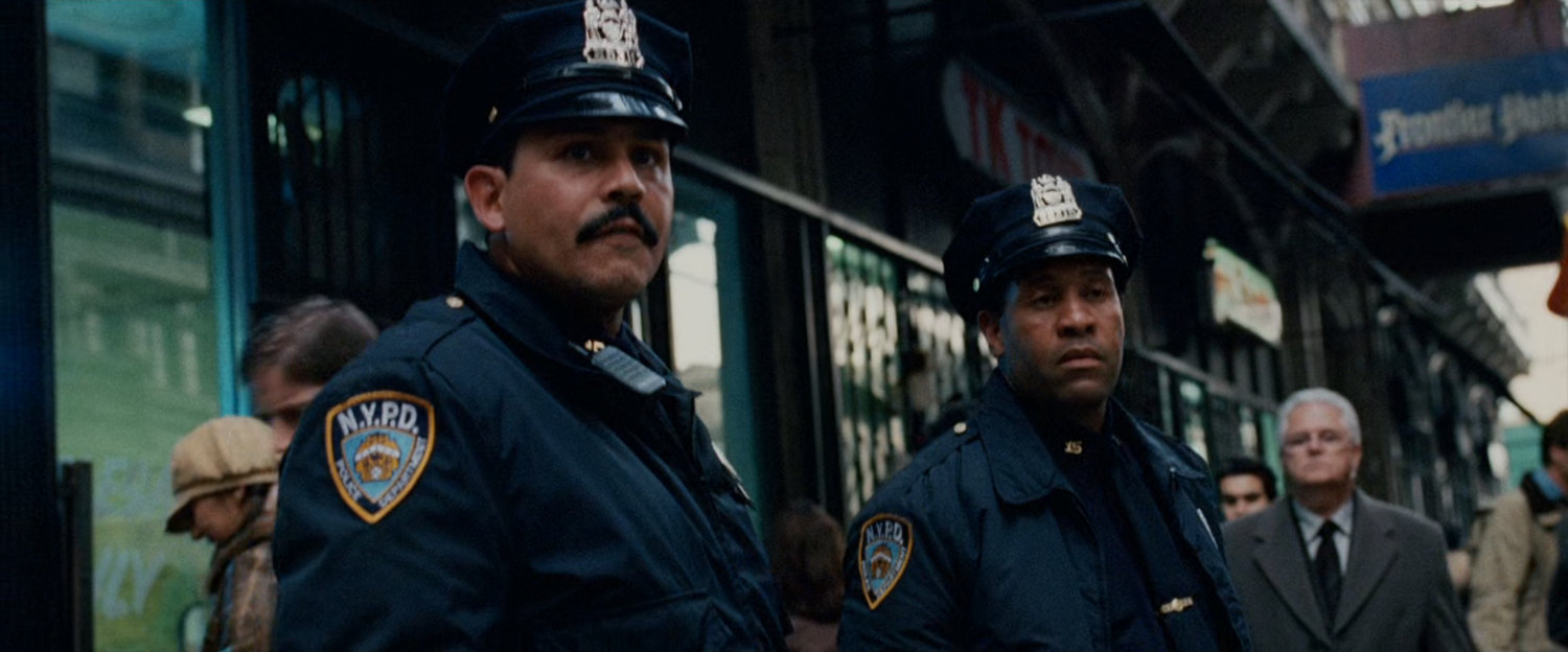 Police Officers watching suspect.