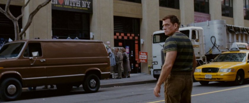 Flint Marko crossing street.