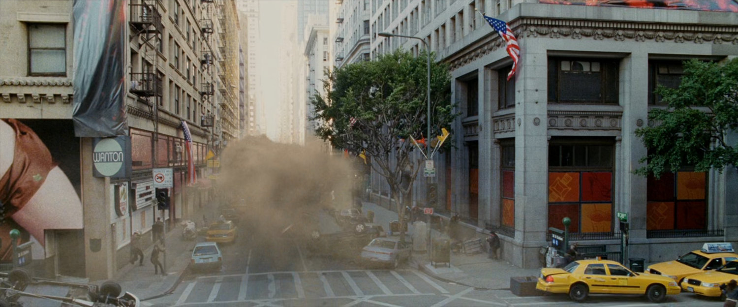 Sandman discorporates and blows down city street.