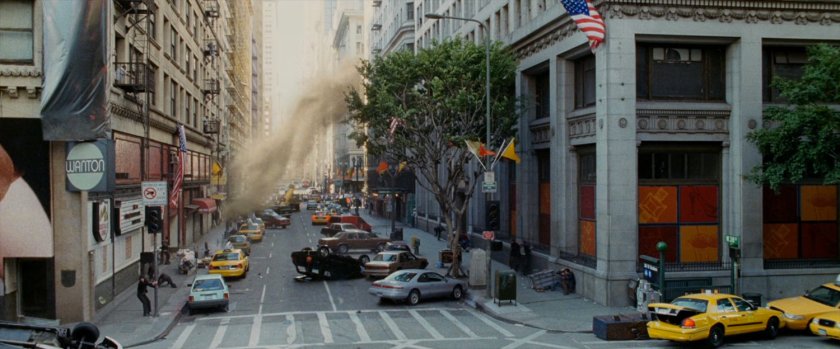 Sandman discorporates and blows down city street.