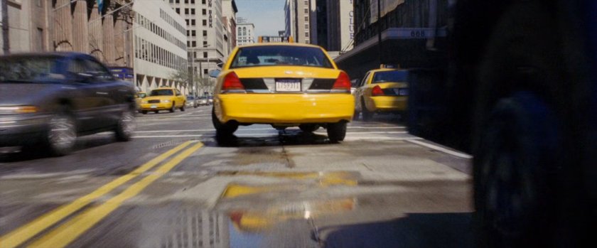 Yellow cab in the street.