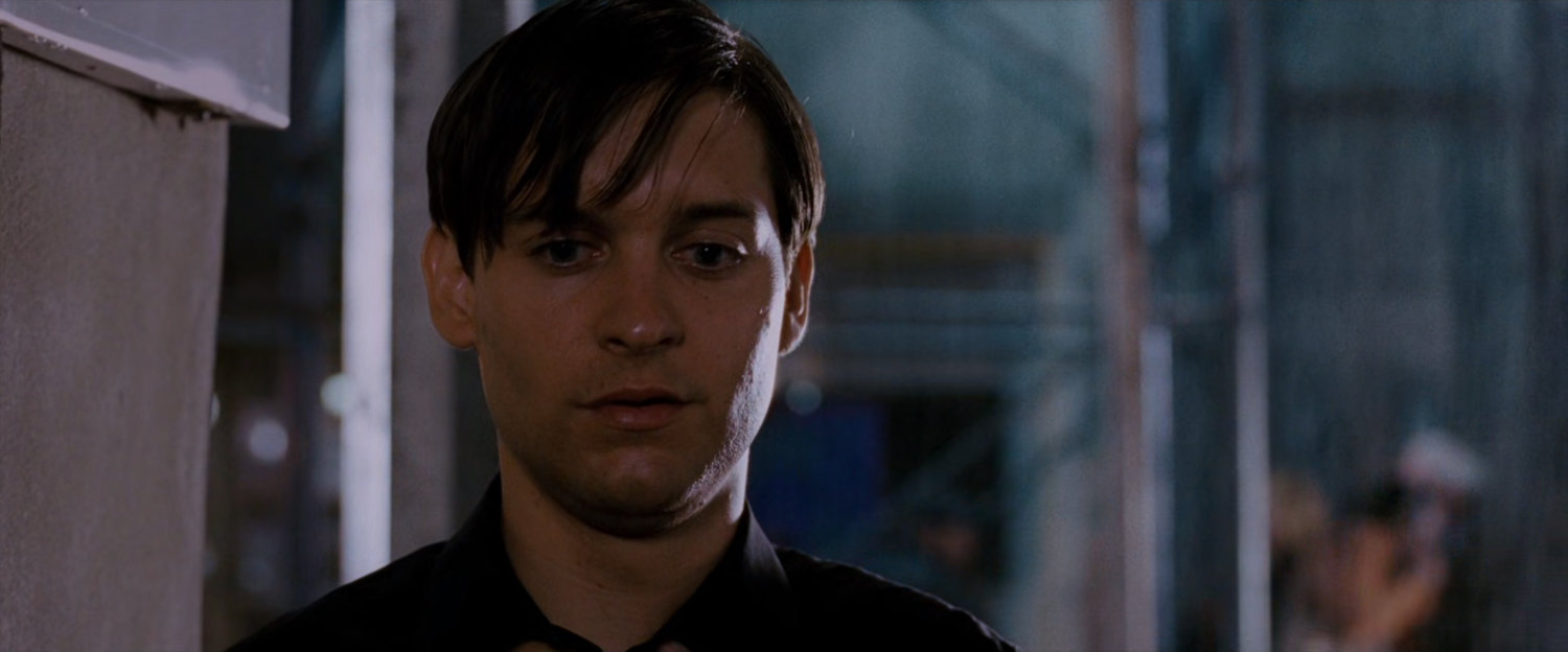 Peter Parker on a street corner.