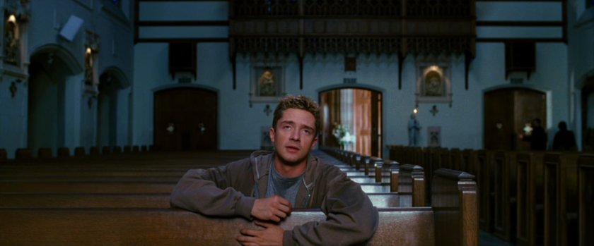 Eddie Brock in gothic church.
