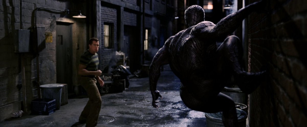 Sandman and Venom in an alley.