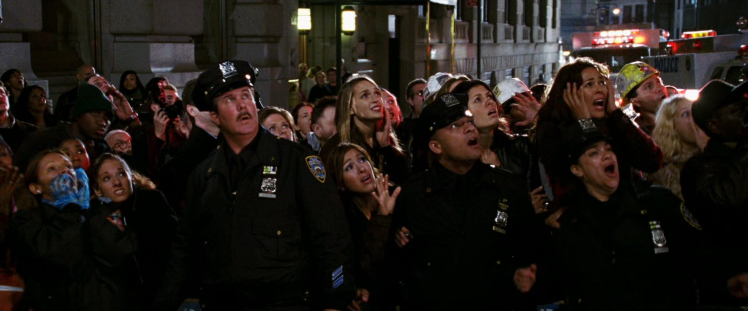 Crowd reacting to fight off screen.