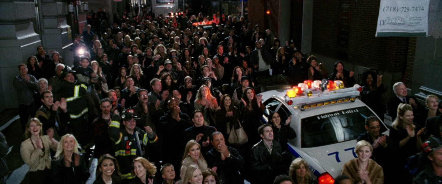 Crowd reacting to fight off screen.