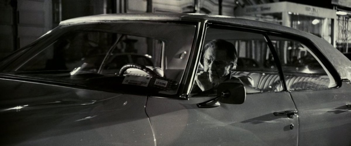 Uncle Ben waiting in a car.