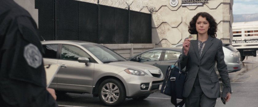 Jennifer Walters shows ID to the Department of Damage Control Supermax Prison guard.
