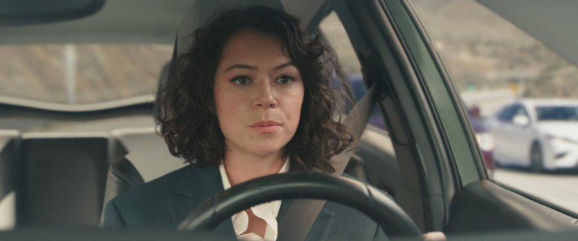 Jen Walters driving in a car on the freeway.