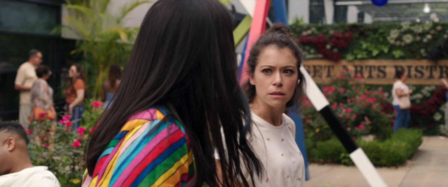 Jen and Nikki talk about Titania's usage of the She-Hulk name in a plaza outside a pop-up store.
