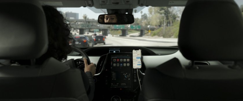 Jen Walters drives her car on the freeway.