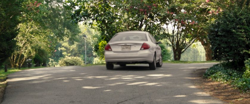 A car on the driveway at the A car pulls up in front of the Summer Twilights retreat.
