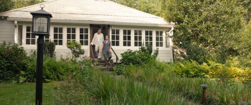 Jen Walters and Emil Blonsky exit a house at the Summer Twilights retreat.