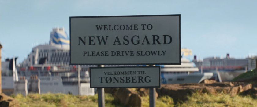 Sign reading Welcome to New Asgard. Please drive slowly. Velkommen til Tønsberg.