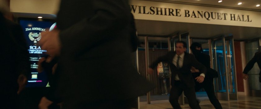 Panicked people leave the Wilshire Banquet Hall.