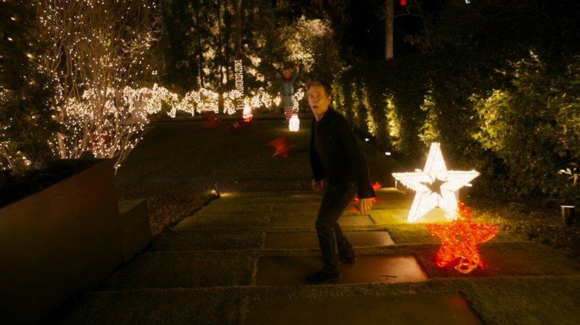 Kevin Bacon runs through his backyard.