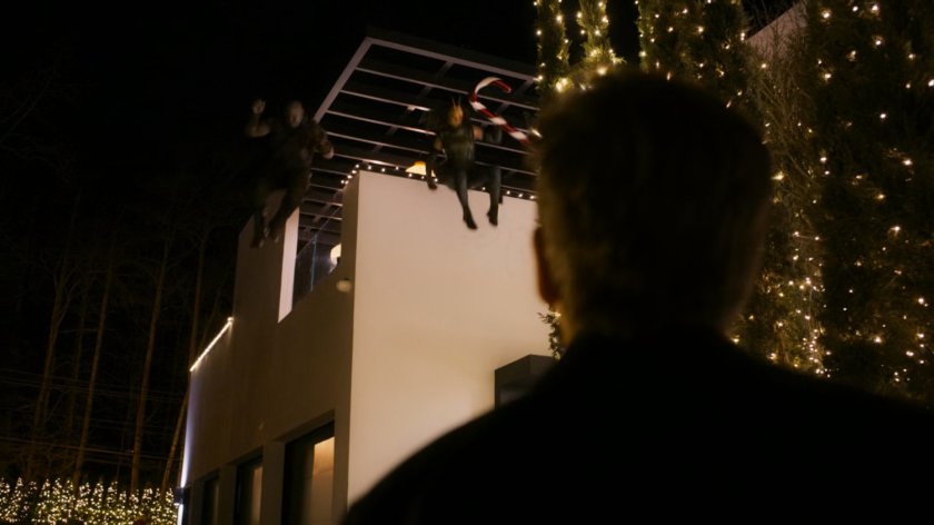 Drax and Mantis jump off Kevin Bacon's balcony.