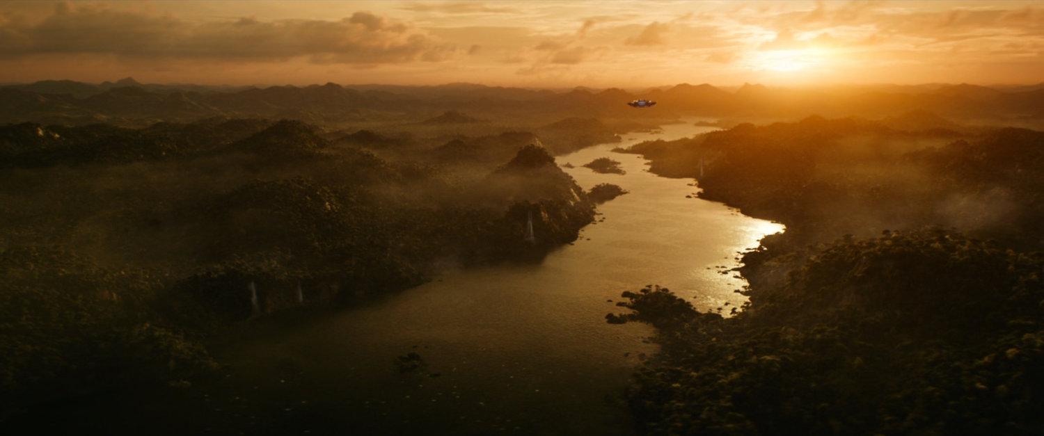 The sun rises over a river in Wakanda.