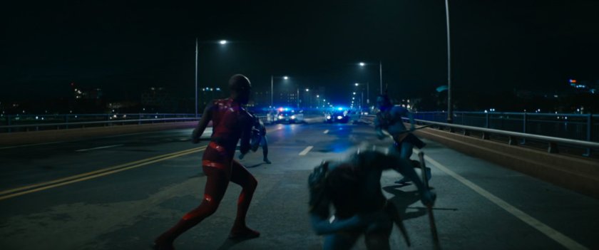 Attuma and Namora fight Okoye on Boston bridge at night.