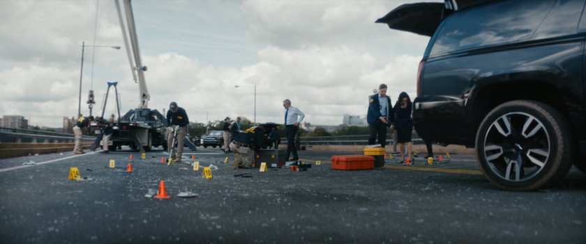 Accident aftermath scene on Boston bridge.