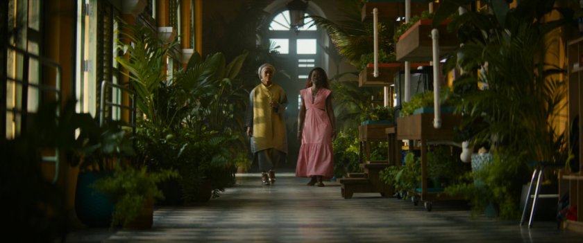 Ramonda and Nakia in hallway in Haitian school.