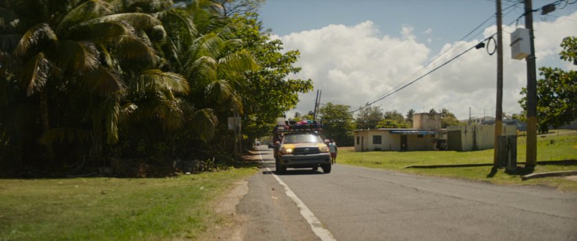Pickup truck on Haitian road.