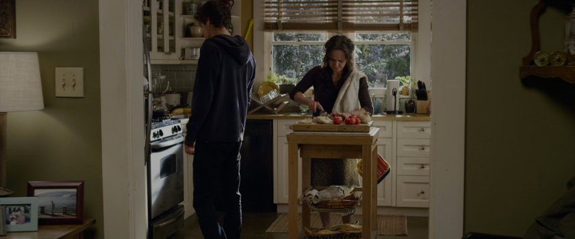 Peter Parker and Aunt May in the kitchen.