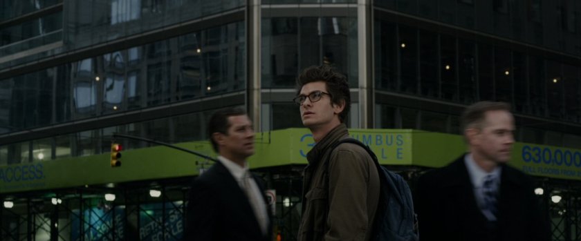 Peter Parker looking up at Oscorp Tower.