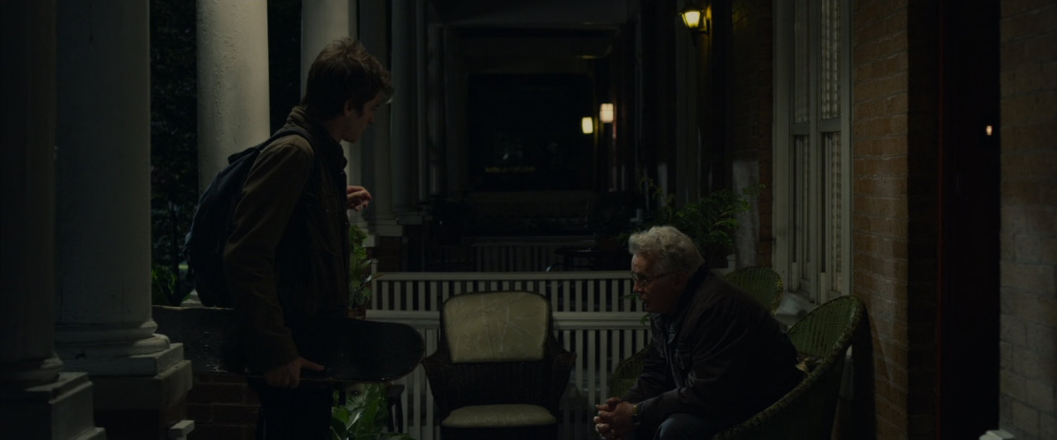 Peter Parker and Uncle Ben on the porch.