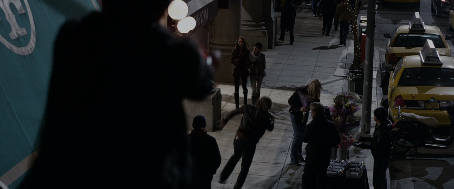 Spider-Man witnesses a thug running down a sidewalk.
