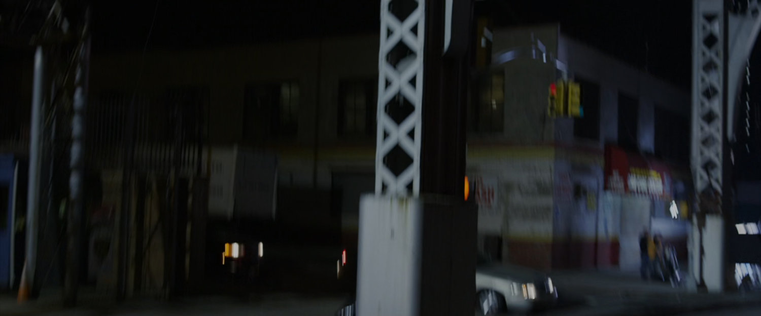 POV of Spider-Man swinging under a bridge.