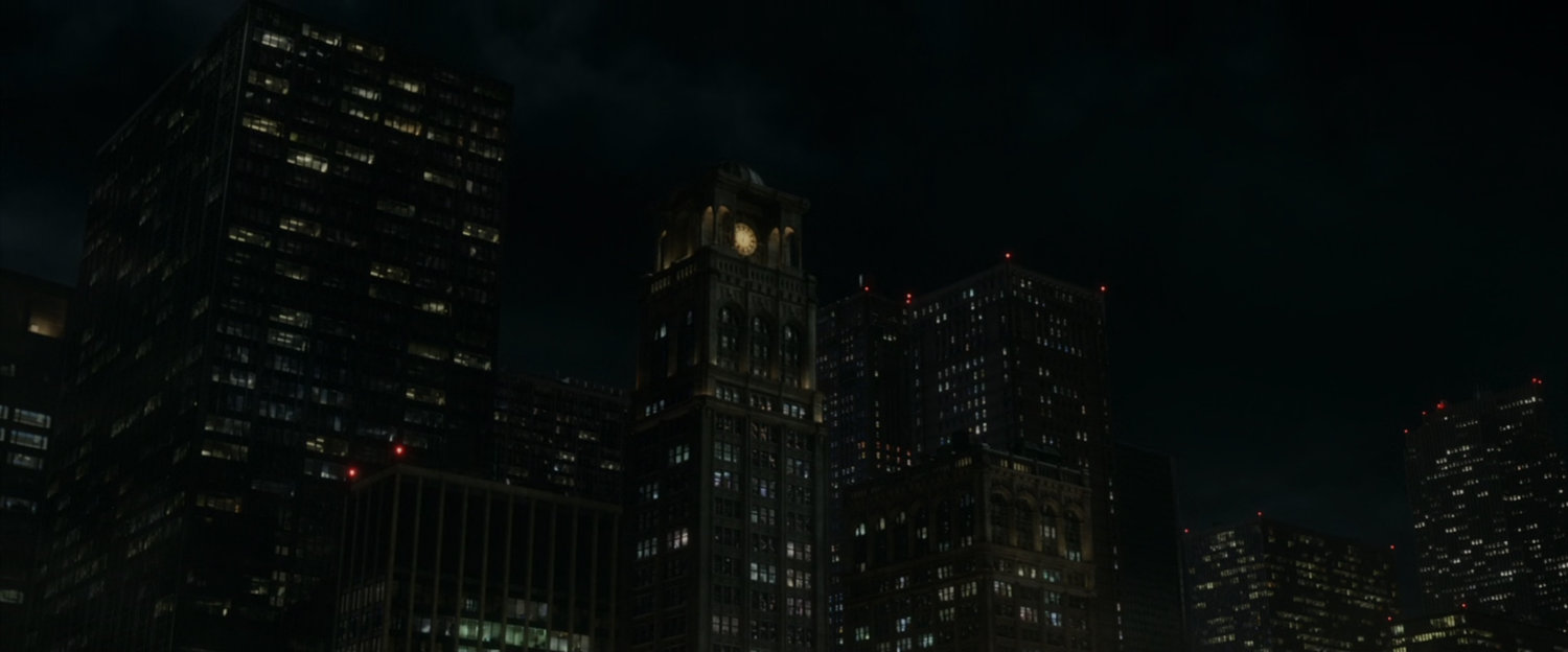View of clock tower building at night.
