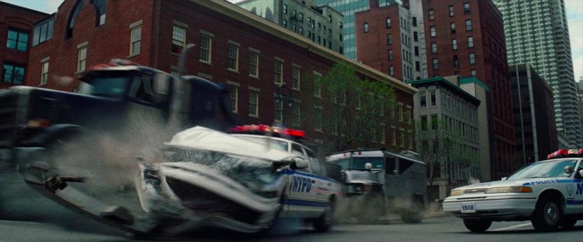 Tow truck crashes through police cars.