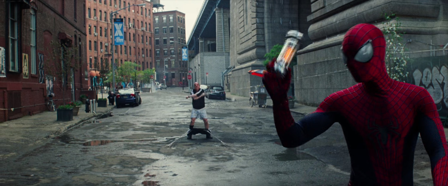 Spider-Man holds a canister taken from Alexei Sytsevich.