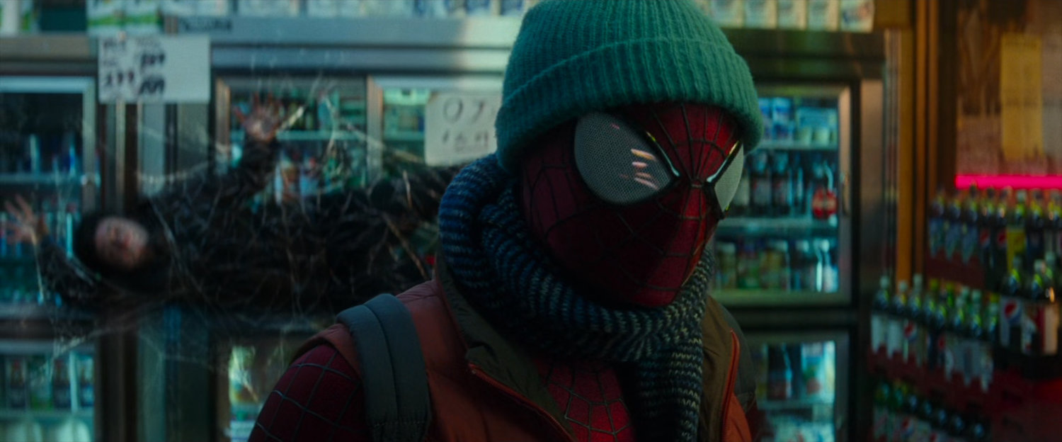Spider-Man in bodega with webbed robber.
