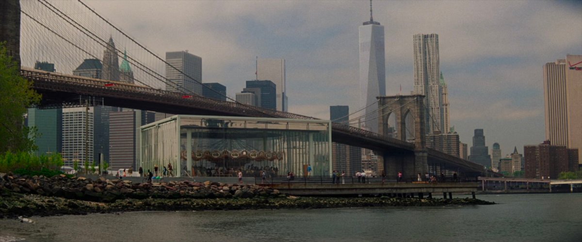 Pier and water next to the Brooklyn Bridge.