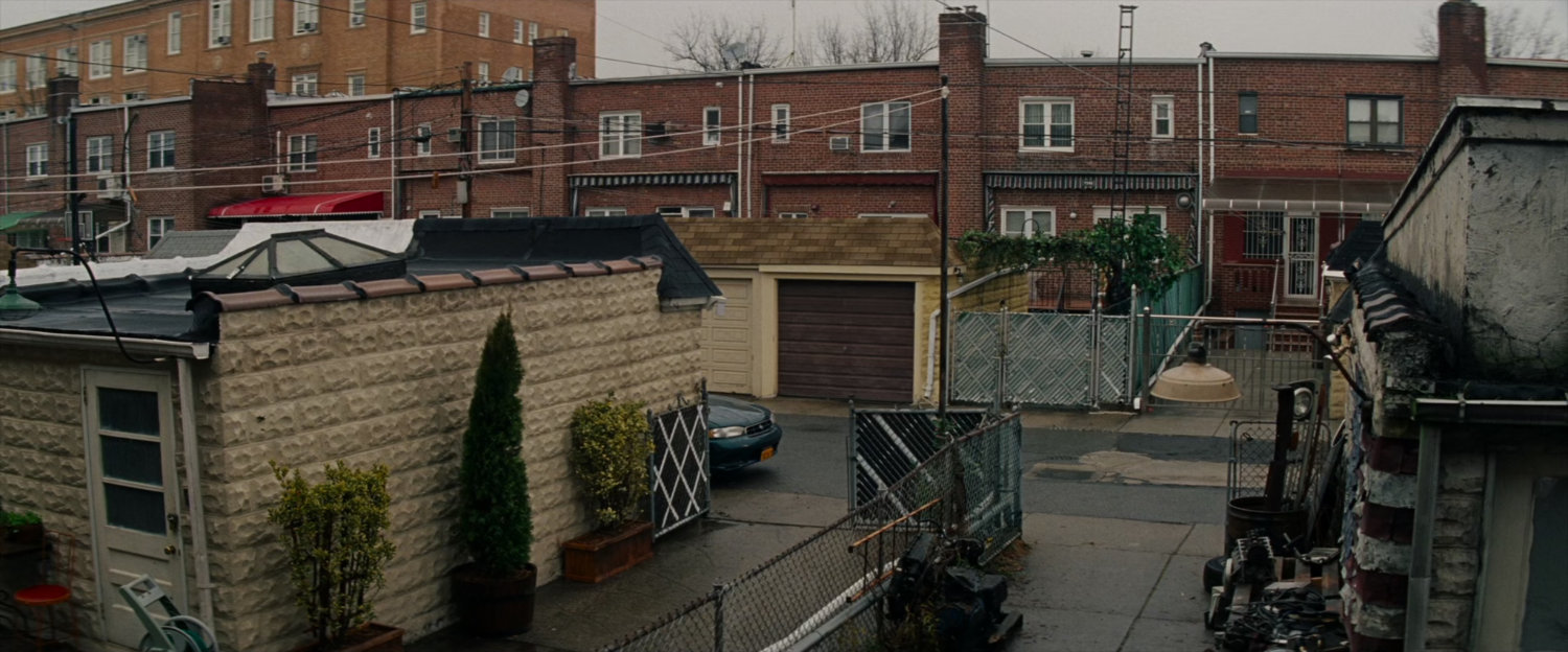 Residential garages in an alley.