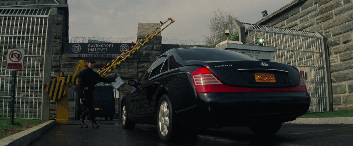 Car arriving at security checkpoint at Ravencroft Institute.