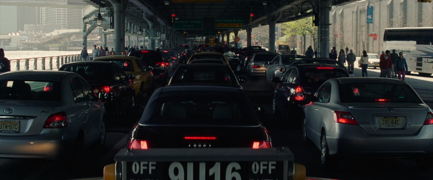 Traffic jam under a bridge.