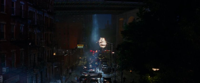 Street lights explode over city street.