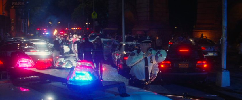 Police direct stopped traffic during blackout.