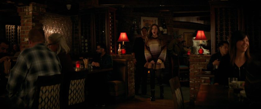 Cassie Lang surprised in a fancy restaurant.