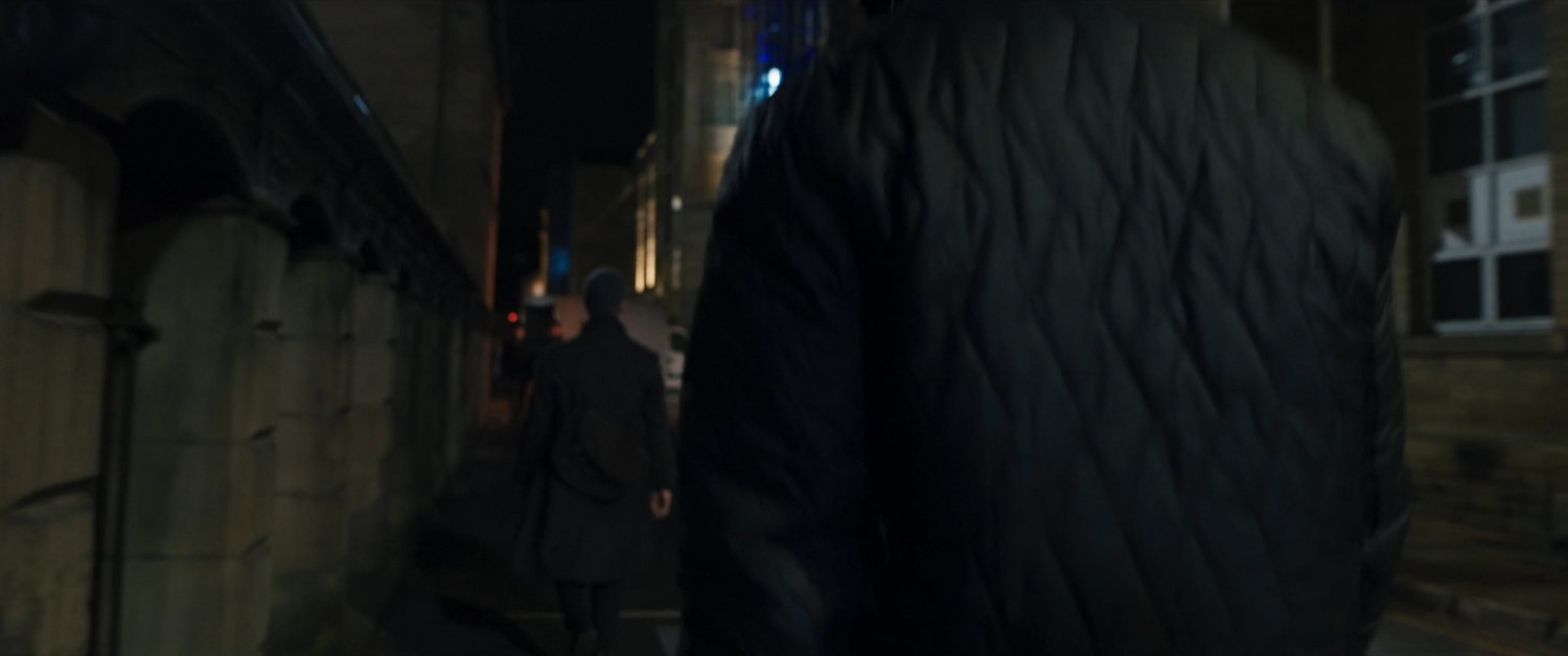 Agent Ross on a dark Moscow sidewalk followed by someone.