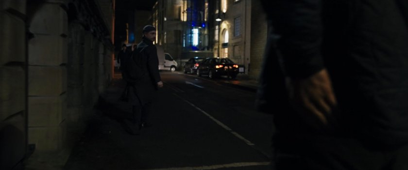 Agent Ross on a dark Moscow sidewalk followed by someone.