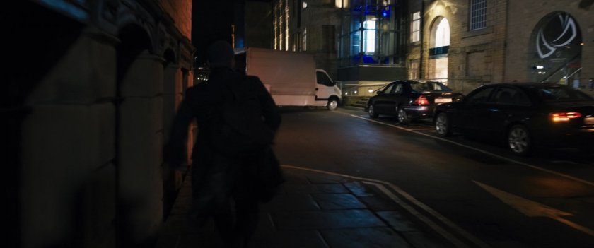 Agent Ross on a dark Moscow sidewalk followed by someone.