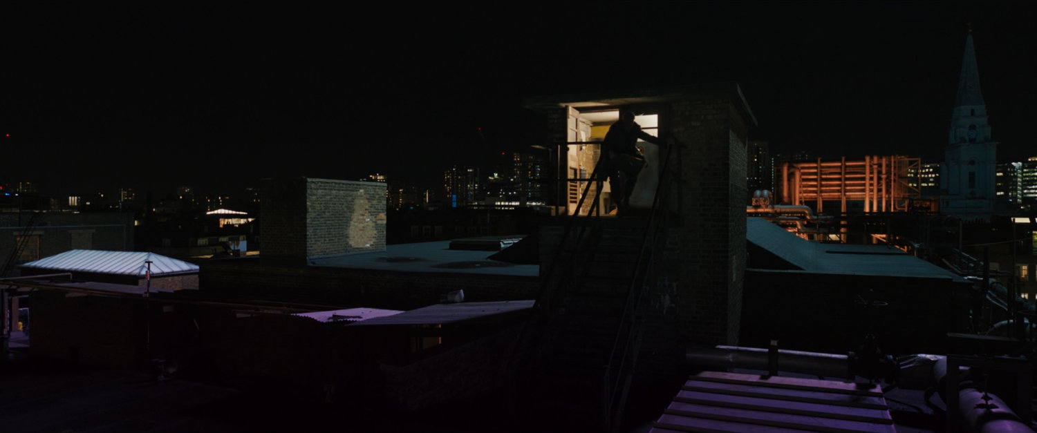 Agent Ross exiting stairwell onto Moscow roof.